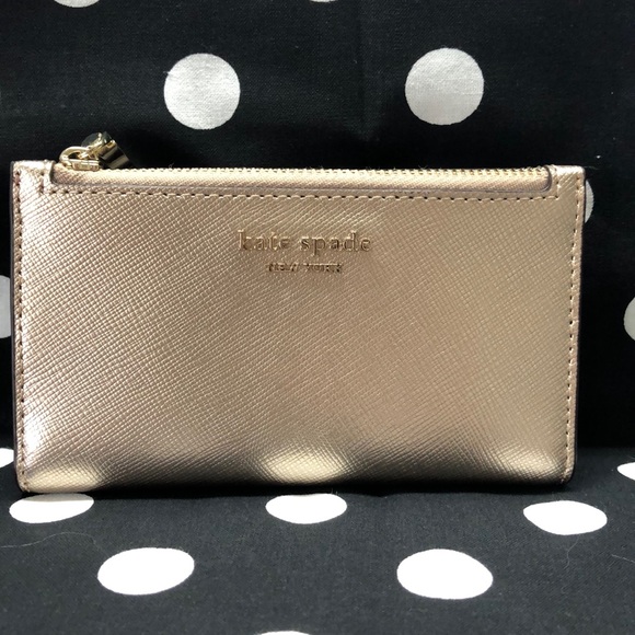 kate spade Handbags - Kate Spade Spencer Small Slim Bifold Wallet